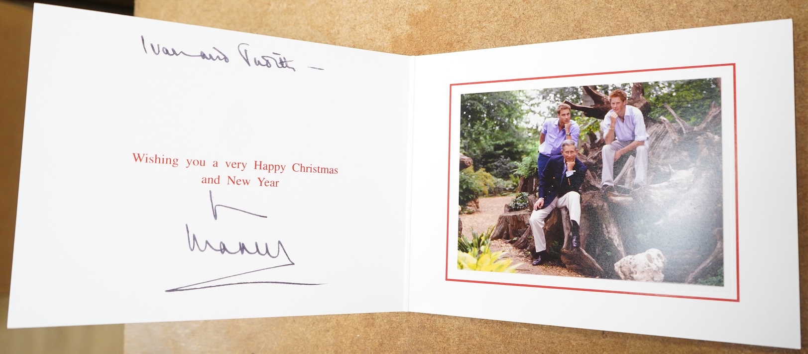 Royal interest; a Christmas card (2002) signed by King Charles